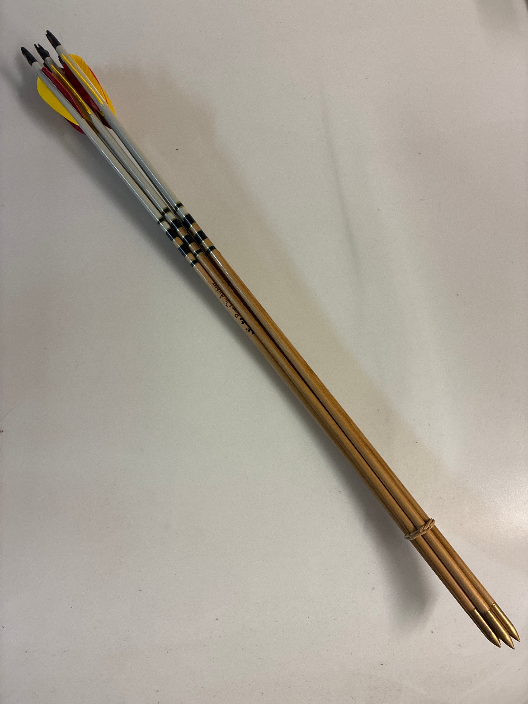 7x Rose City spine/weight matched arrows. 5/16, 35lb, 27”, 100gn piles fitted.