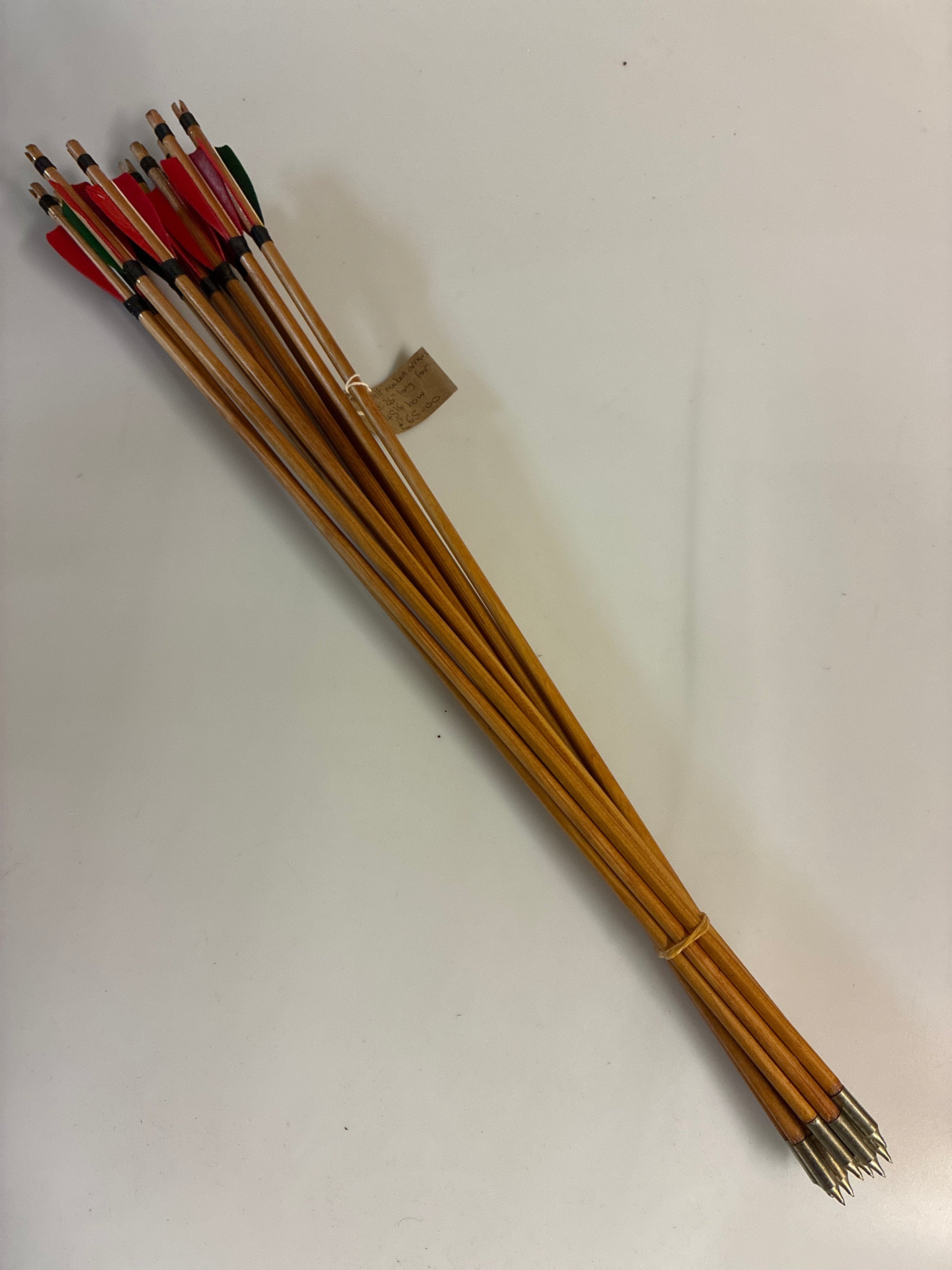 11xhandmade primitive arrows. 45lb @ 26”. Self nocked, 100gn piles.